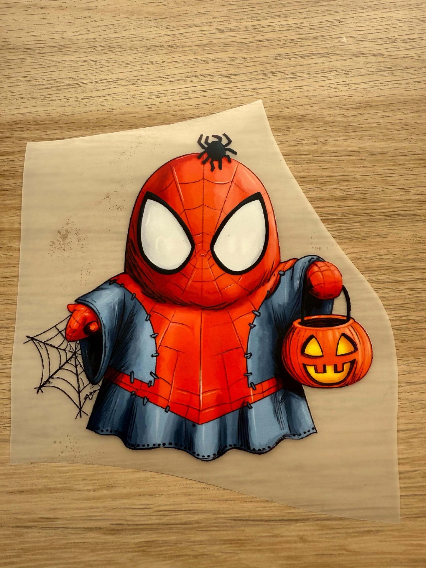 Bügelbild Spinnenkraft mit Netz, Kürbis und Halloween-Deko