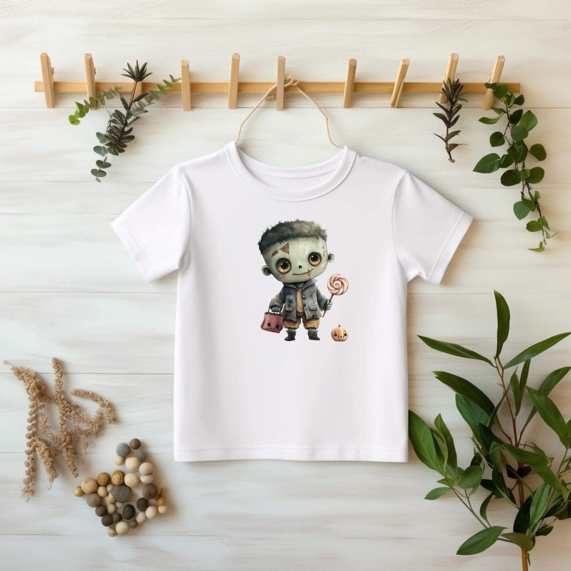 Buegelmotiv Monster mit Trick or Treat Tasche und Kuerbis