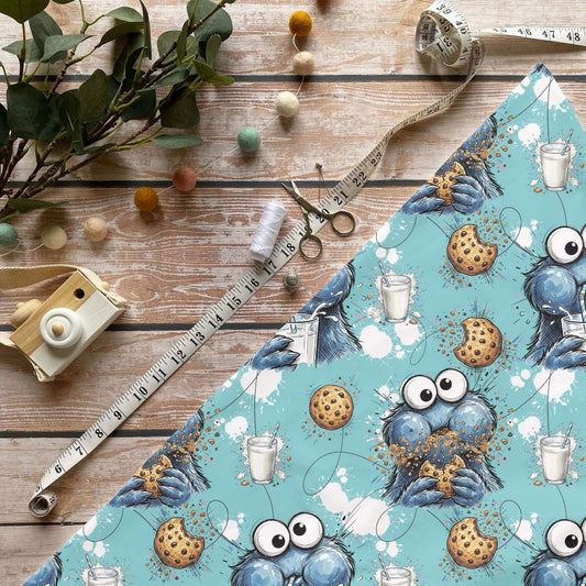 Cookie Chaos Baumwolle 0,5m Sofortkauf Lagerware OEKO-TEX Standard 100 mit blauen Monstern, Keksen und Milch

