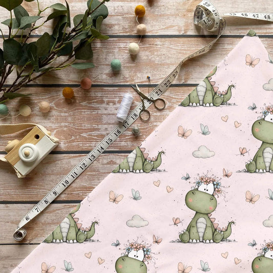 Kinderstoffe Meterware Niedlicher Dino Blumenkranz Rosa Baumwolle
