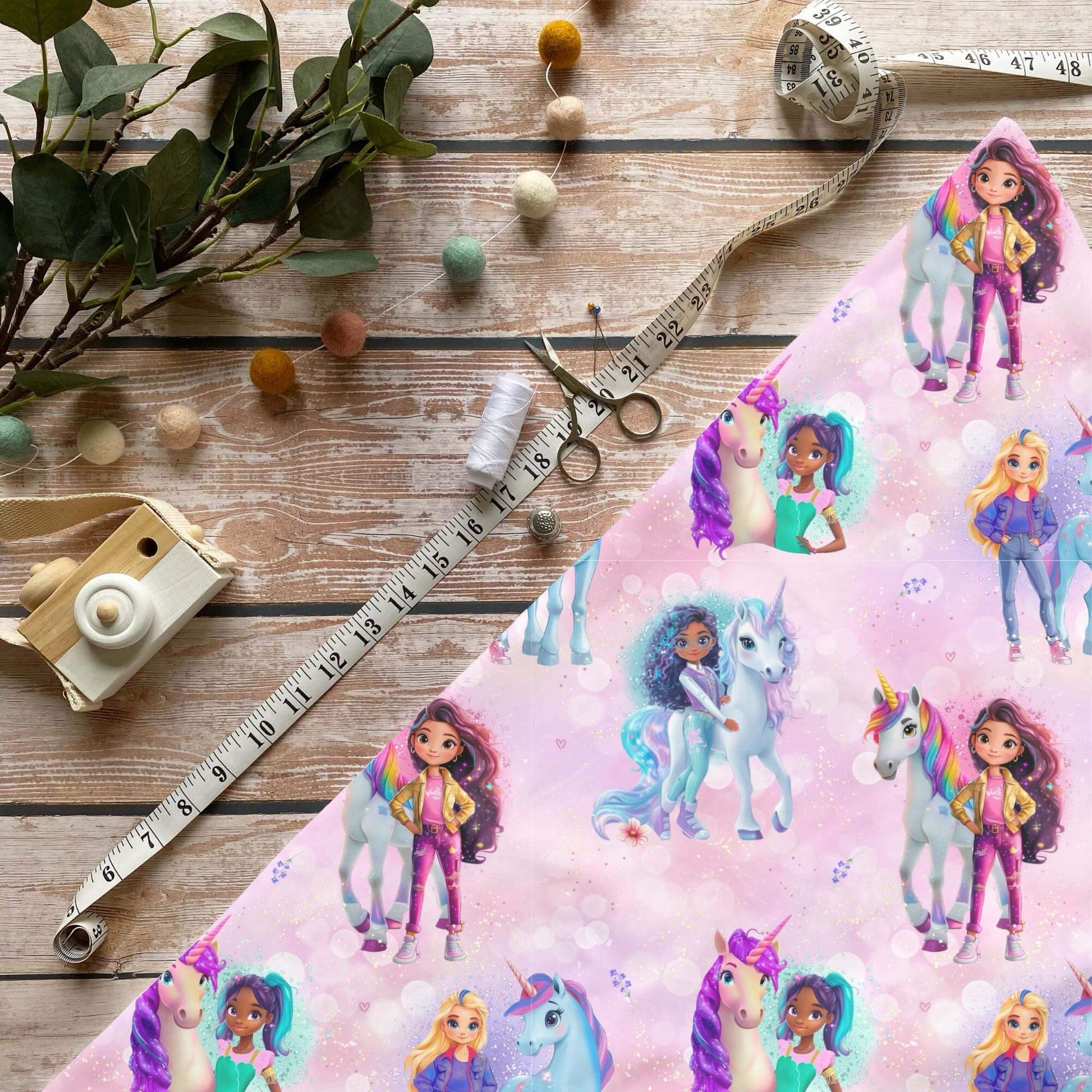 Einhornreiterin Jersey Stoff mit Mädchen- und Einhornmotiv auf rosa Hintergrund