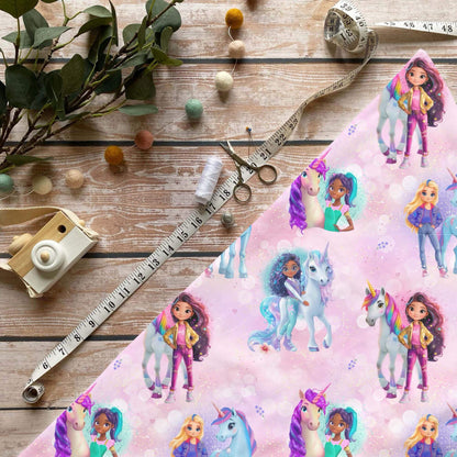 Einhornreiterin Jersey Stoff mit Mädchen- und Einhornmotiv auf rosa Hintergrund