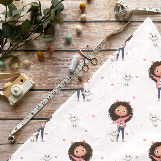 Katzenmädchen Baumwollstoff mit Mädchen- und Katzenmotiv auf rosa Hintergrund