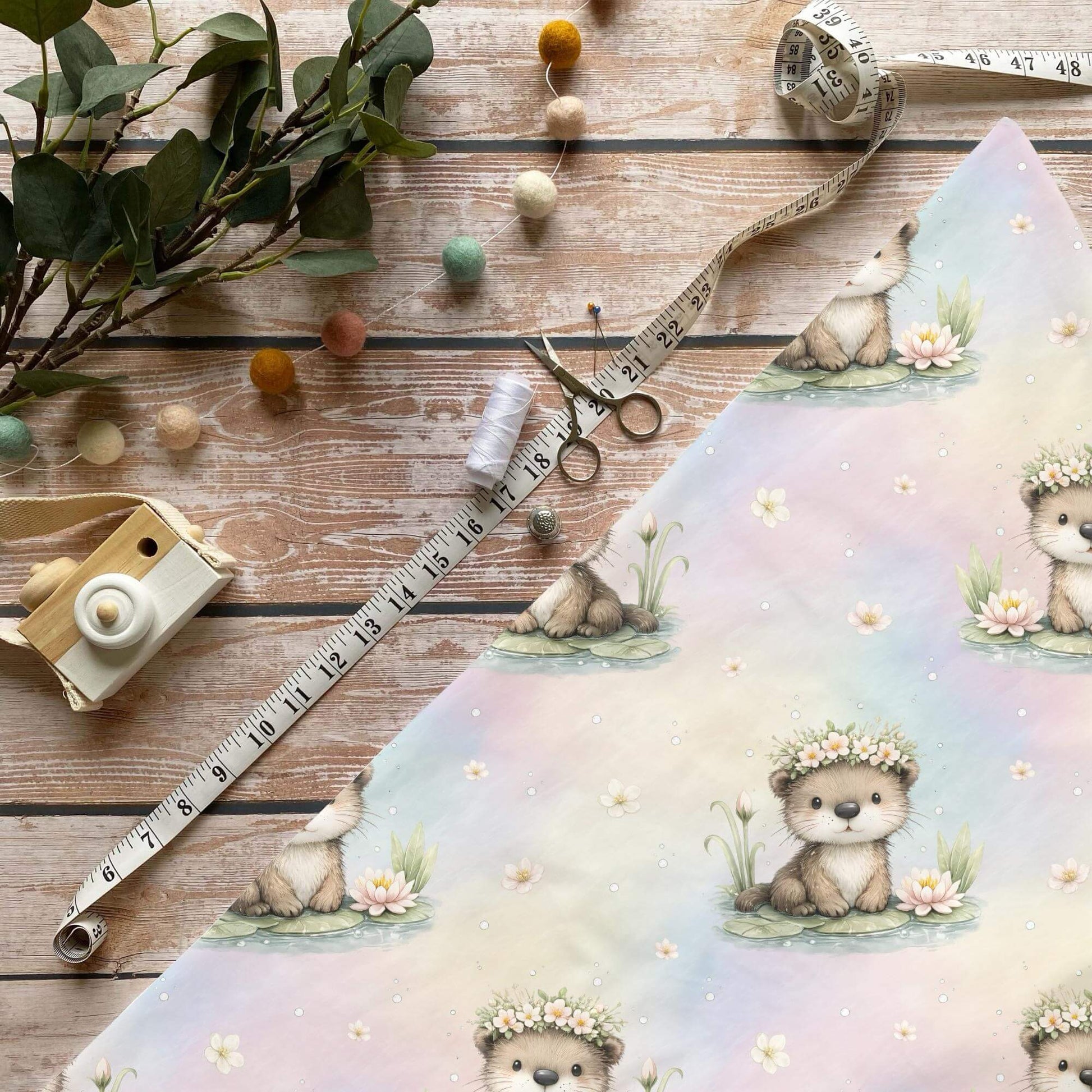 Otter mit Blumenkranz Stoff Meterware für liebevolle Kinderkleidung