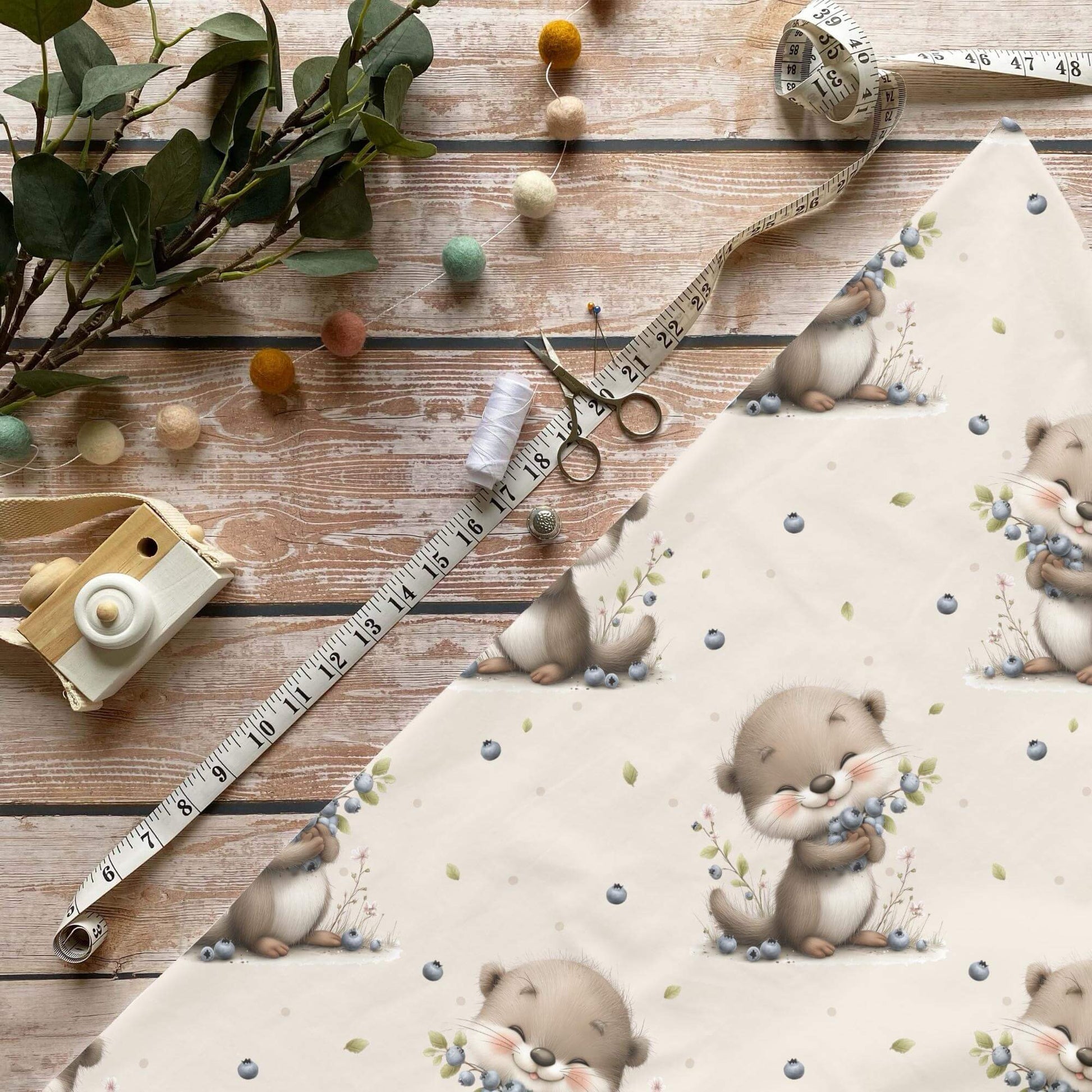 Kinderstoff Otter mit Blaubeeren Jersey Meterware beige

