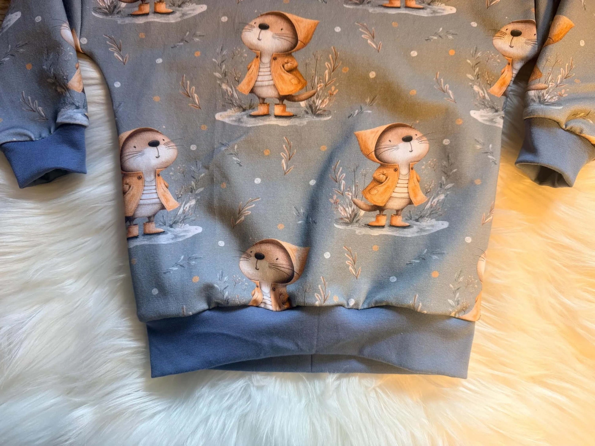 „Unisex Kinderkleidung – Pullover mit niedlichem Otterdesign in verschiedenen Größen“