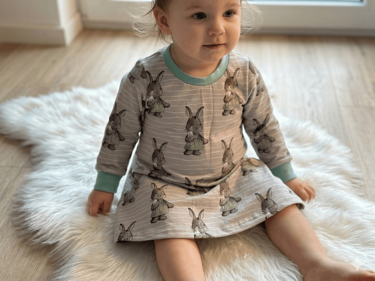 Kleid Größe 80 in Beige mit Hasenmuster
